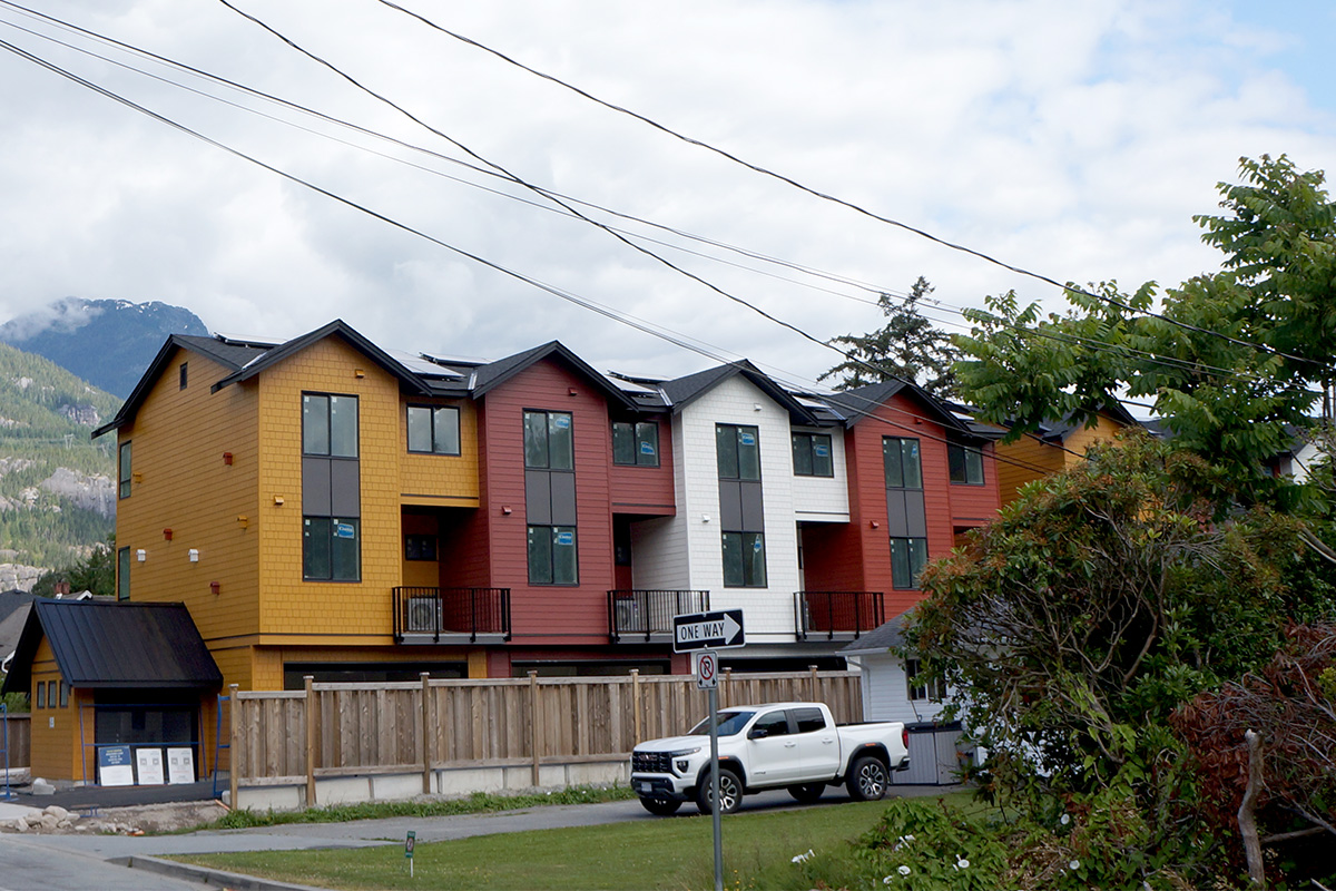 regen homes chickadee lane solar panels bird houses pirate ship playground see these new squamish townhouses 1200x800